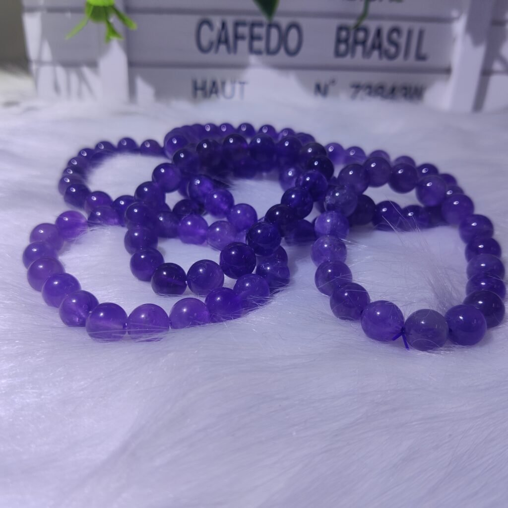 Amethyst bead bracelets displayed together